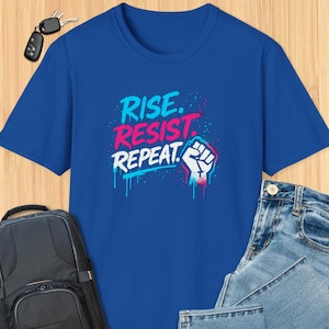 Rise Resist Repeat Graphic T Shirt – Bold Protest Streetwear Tee Fist Art, Unisex Activist Top, Empowerment Graffiti Style Apparel Softstyle