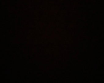 Puede incluir: Un fondo negro.