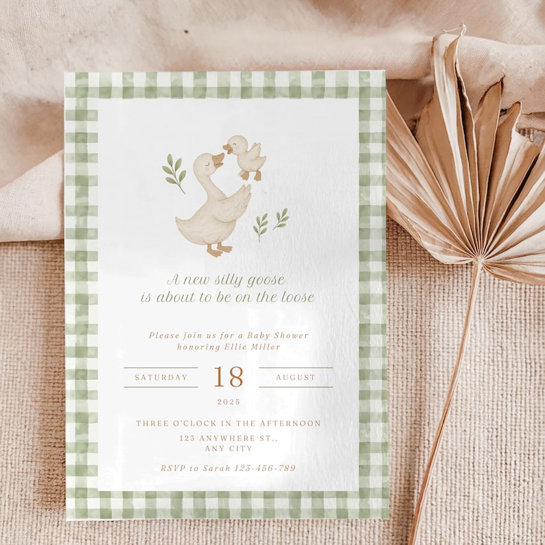May include: Baby shower invitation with a watercolor illustration of a mother goose and gosling. The invitation has a green and white gingham border and includes the text "A new silly goose is about to be on the loose."