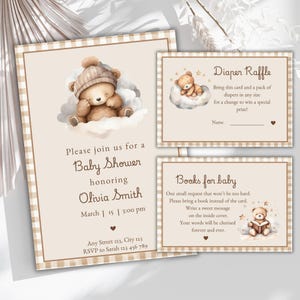 May include: A baby shower invitation with a brown teddy bear illustration. The invitation includes the text "Please join us for a Baby Shower honoring Olivia Smith, March 15 | 3:00 pm, Any Street 123, City 123, RSVP to Sarah 123 456 789". There are also two cards for guests to bring a diaper or a book for the baby.