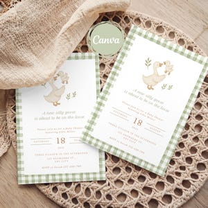 May include: Two baby shower invitations with a green gingham border. The invitations feature a watercolor illustration of a goose and gosling. Text reads "A new silly goose is about to be on the loose". The date is August 18, 2025.