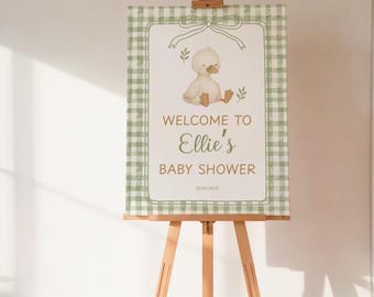 Modello modificabile per cartello di benvenuto per baby shower a forma di oca, cartello per baby shower neutro rispetto al genere, cartello stampabile con cosparsione di oca verde a quadretti