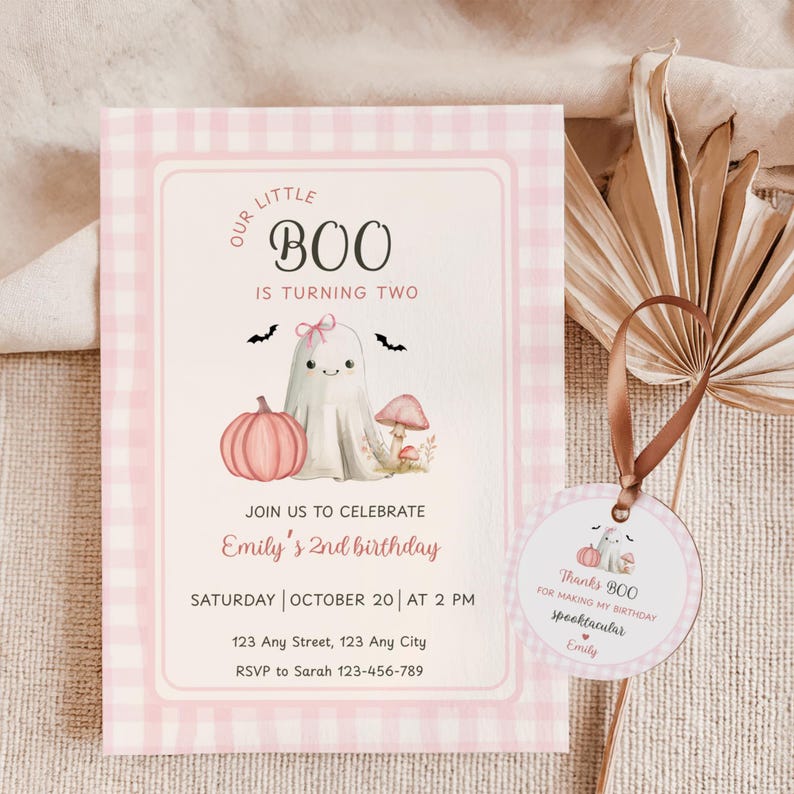 May include: A pink and white gingham patterned invitation for a second birthday party. The invitation features a cute ghost, pumpkin, and mushroom illustration. Text includes "Our Little Boo is Turning Two" and party details.