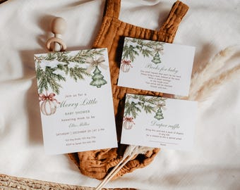 May include: Baby shower invitations and cards with a winter holiday theme. The invitation reads "Join us for a Merry Little Baby Shower." The cards include "Books for baby" and "Diaper raffle" text. The design features watercolor illustrations of pine branches, ornaments, and a Christmas tree.