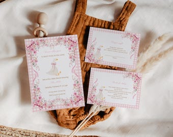 May include: Baby shower invitation and game cards with a pink and white gingham pattern. The invitation features a goose illustration and floral accents. The game cards include prompts for diapers and wishes for the baby.