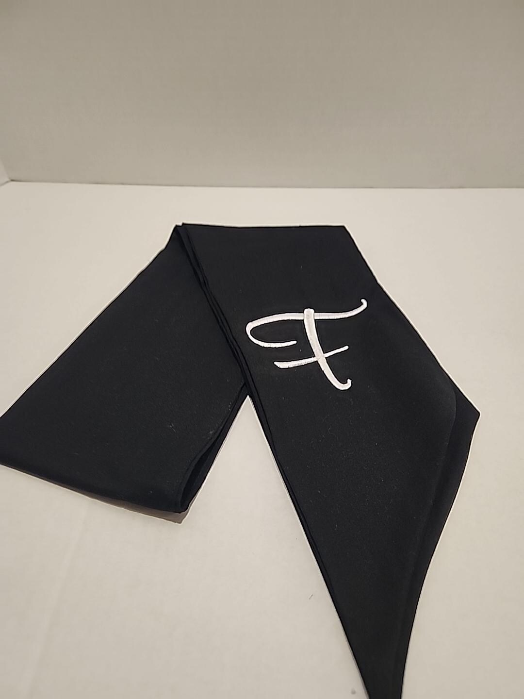 Black Wreath Sash Monogrammed With the Initial 