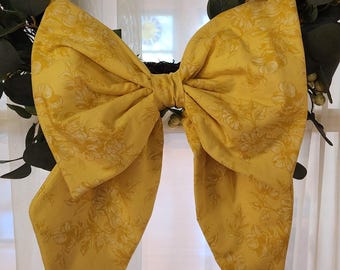 Large quilted fabric bow for wreath or home decor