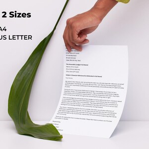 May include: A white sheet of paper with text is held by a hand, with a long green leaf in the foreground. The text on the paper is a formal letter. The text "In 2 Sizes" is at the top left, with "A4" and "US LETTER" below it.