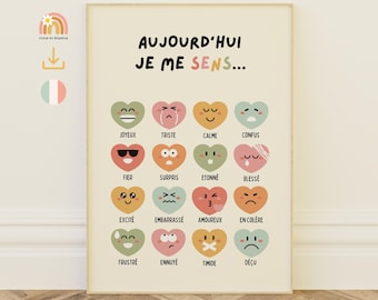 May include: A framed poster with the text "AUJOURD'HUI JE ME SENS..." above a grid of heart-shaped emojis, each depicting a different emotion. The emotions include happy, sad, calm, confused, proud, surprised, and more. The poster is on a wooden floor.