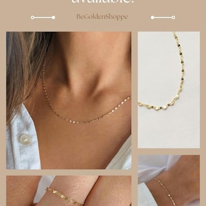 May include: Gold-toned jewelry set featuring a delicate necklace, bracelet, and ring. The necklace is worn around the neck, the bracelet on the wrist, and the ring on a finger. The text "Matching pieces available!" is displayed.