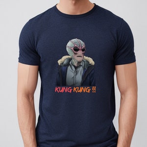 May include: A navy blue t-shirt with a graphic of a grey alien wearing a brown jacket and the text "KUNG KUNG!!" in red.