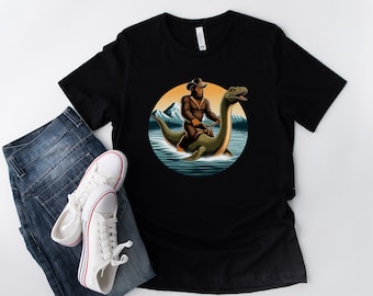 Bigfoot Riding Loch Ness Monster T-Shirt: Hilarious Sasquatch Tee