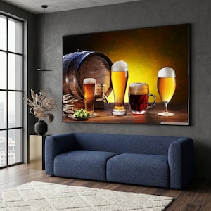 May include: A large framed print featuring a wooden beer barrel, various beer glasses, and a plate of hops. The beers range in color from light golden to dark amber, all with foamy heads. The background is a gradient of yellow and brown.