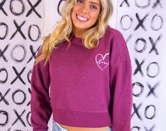 Sudadera corta con cuello redondo y estampado "Love" de frambuesa