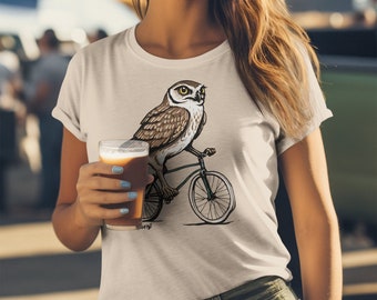 Burrowing Owl Riding a Bicycle T-Shirt | Unisex Cycling Tees, Fun Gifts for Bike Lovers, Animal Lovers T-Shirts, 100% Eco-Friendly Cotton
