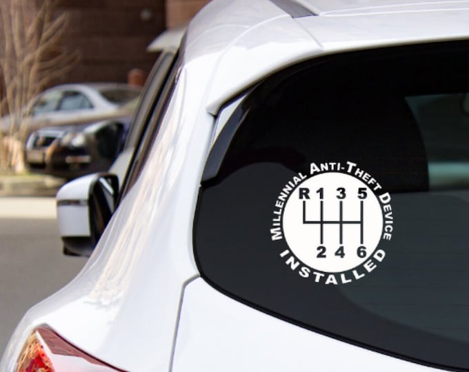 Featured listing image: Upgrade Your Car's Look with Our 'Anti Theft Device Installed' Manual Shift Pattern Vinyl Decal - Drive with Confidence & Style Today!