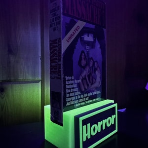 Interchangeable VHS movie stands image 2