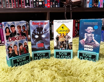 Now playong  VHS movie stands