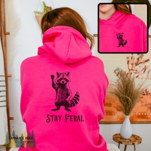 Stay Feral Hoodie Raccoon Sweatshirt Funny Racoon Hoodie Trash Panda Hoodie Feminist Protest Hoodie Unisex Graphic Hoodie Animal Lover Gift Heliconia