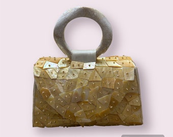 Beautifully handcrafted seashell clutch