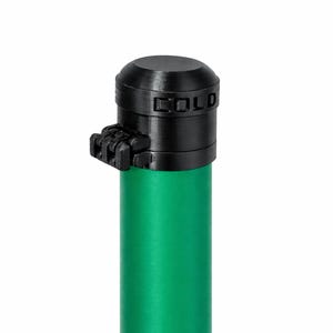 May include: A black plastic cap with the word "COLD" printed on it, attached to a green pole. The cap has a rounded top and a small, rectangular clasp. The pole is a vibrant green colour.