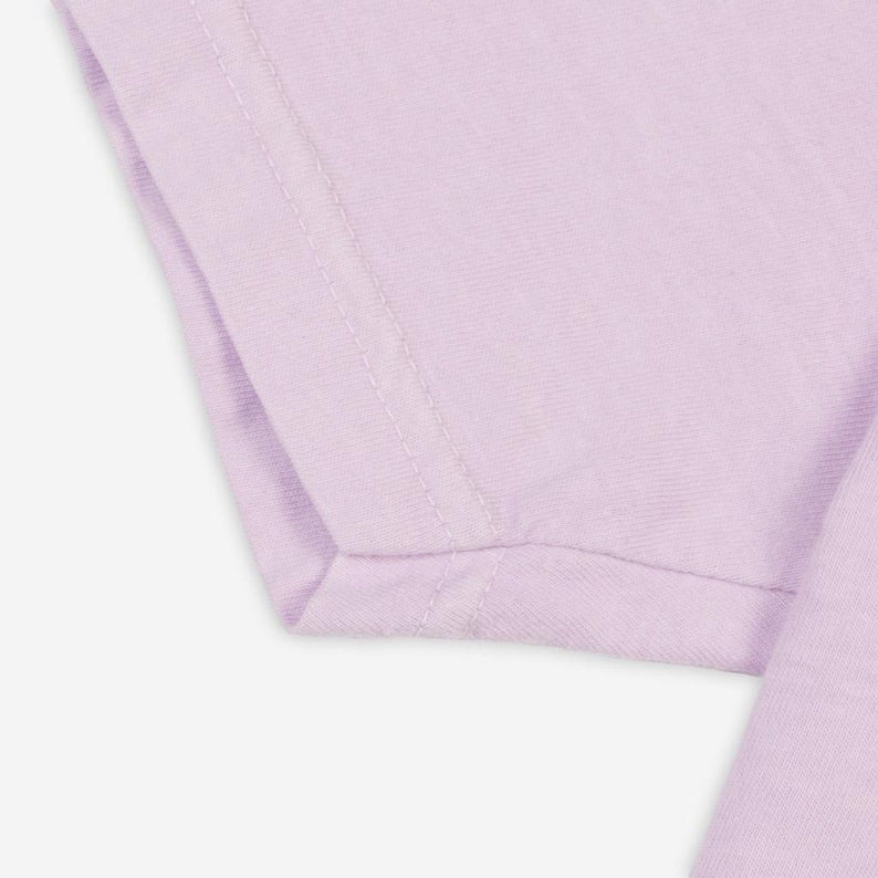 Close-up image of the lilac covered T-shirt shows superior craft