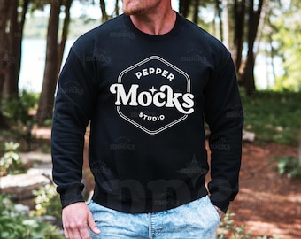 May include: A black sweatshirt with a white logo that says "Pepper Mocks Studio" in a vintage style font.