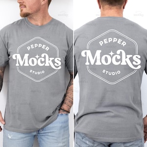 May include: A heather gray t-shirt with a white hexagonal logo that says "Pepper Mocks Studio" on the front and back.