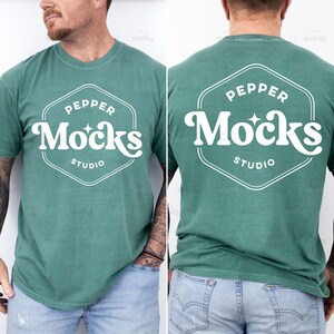 May include: A green t-shirt with a white hexagonal logo that says "Pepper Mocks Studio" on the front and back.