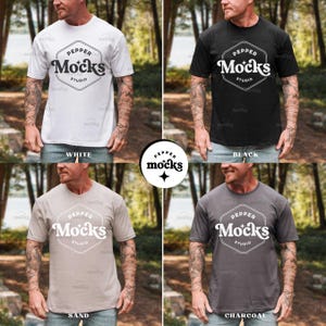 May include: A collection of t-shirts in white, black, sand, and charcoal. Each shirt features the "Pepper Mocks Studio" logo in a white, hexagonal design. The shirts are short-sleeved and appear to be made of a soft material.