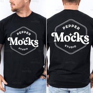 May include: Black t-shirt featuring a white logo with the text "PEPPER Mocks STUDIO" inside a hexagon. The image shows the front and back of the t-shirt. The model is wearing blue jeans.
