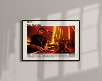 May include: Framed poster featuring Kerri Chandler performing live, playing a keyboard. The image has a warm, orange and yellow color scheme with stage lighting. The poster includes text with the artist's name and location.