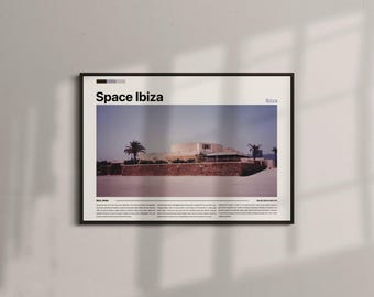 May include: Framed poster featuring a vintage photograph of a building with palm trees, labeled "Space Ibiza." The poster has a black frame and is mounted on a light gray wall. The text "Ibiza" is also visible.