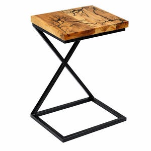 May include: A square side table with a natural wood top featuring a unique, lightning-like pattern. The tabletop is supported by a black, geometric metal frame. The table is designed for indoor use.