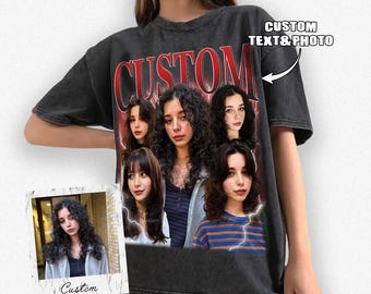 May include: A black t-shirt with a vintage-style graphic print of multiple people. The graphic includes the word "CUSTOM" in red letters. The t-shirt is being modeled by a person.