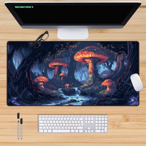 May include: A dark blue gaming mouse pad with a pixelated image of a forest scene with glowing mushrooms and a stream.