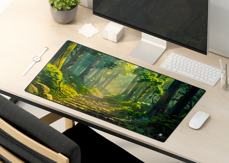 May include: A green and brown forest scene with a path leading through the trees. The scene is printed on a black mousepad.