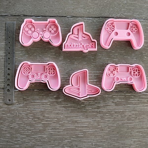 May include: A set of three ceramic mugs with a speckled, matte finish. The mugs are in shades of cream, light gray, and dark gray. Each mug has a simple, minimalist design, perfect for coffee or tea.