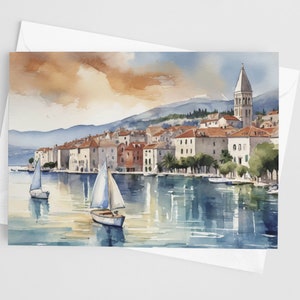May include: Watercolor painting of a coastal town with a tall church steeple, sailboats in the water, and a mountain range in the background.