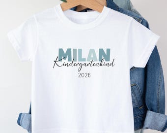 Camiseta personalizada para criança em idade pré-escolar, camiseta para o início do jardim de infância, presente para o início da creche, criança que começará o jardim de infância em 2026.