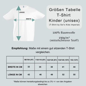 May include: White children's t-shirt with size chart. The chart shows measurements in centimeters for width and length, ranging from 32 cm to 44 cm wide and 43 cm to 55 cm long. The shirt is made of 100% cotton.