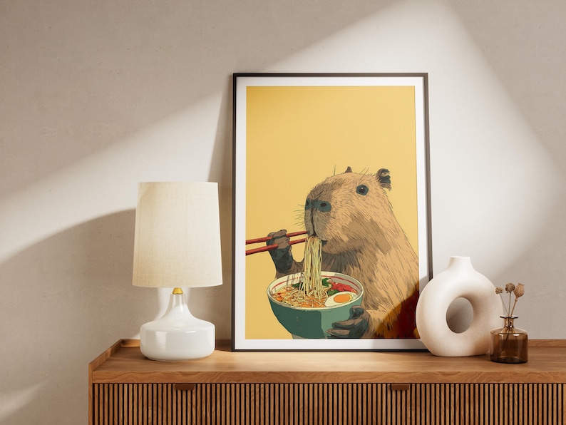 Cute Capybara Eating Ramen Noodles with Chopsticks Humorous Animal Wall Art Print for Kitchen Decor Unique Foodie Illustration Poster Gift image 2