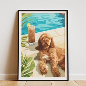 May include: Framed art print featuring a brown dog lounging by a pool with a refreshing drink. The artwork has a sunny, relaxed vibe, with a clear blue pool and tropical foliage. The dog has a light brown coat.