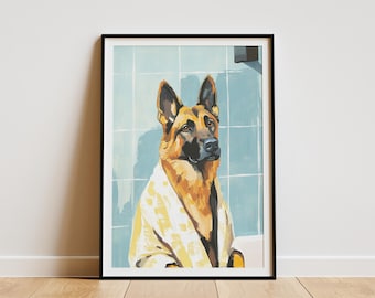 May include: A framed art print featuring a German Shepherd dog. The dog is depicted in a yellow and orange color palette, wrapped in a yellow towel, against a light blue tiled background. The artwork is displayed in a black frame.