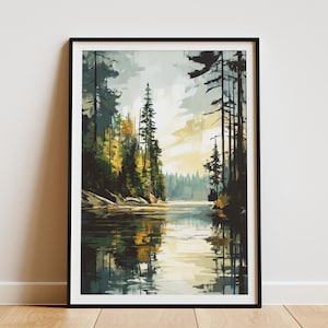May include: Framed landscape art print depicting a serene lake scene. The artwork features a forest of tall trees in shades of green and yellow, reflected in the calm water. The sky is a mix of yellow and gray, creating a peaceful atmosphere.