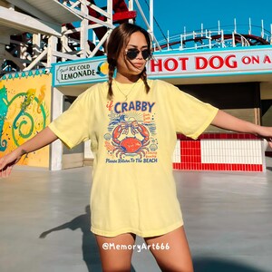 Vintage style sassy summer coquette beach png, cute dancing crab design, funny beach quote shirt, coastal aesthetic summer graphic, retro ocean illustration, beach vacation outfit, trendy women shirt design, Cricut SVG PNG download, sublimation file, bold outline vector, summer beach vibes tee