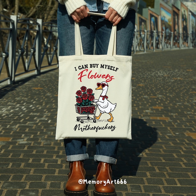 A sarcastic anti-Valentine illustration featuring a confident goose pushing a cart overflowing with red roses. The goose walks with attitude, expressing independence and zero romance vibes. Bold text reads “I can buy myself flowers” and “Motherfuckers,” creating a funny anti-love message. Vintage hand-drawn style on a beige background, perfect for anti-Valentine shirts, stickers, and digital crafts.