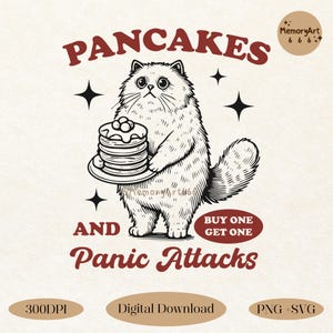 May include: A black and white illustration of a cat holding a plate of pancakes. The text "PANCAKES AND Panic Attacks" is written in red. The text "BUY ONE GET ONE" is written in a red circle.