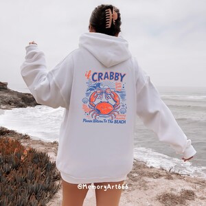 Vintage style sassy summer coquette beach png, cute dancing crab design, funny beach quote shirt, coastal aesthetic summer graphic, retro ocean illustration, beach vacation outfit, trendy women shirt design, Cricut SVG PNG download, sublimation file, bold outline vector, summer beach vibes tee