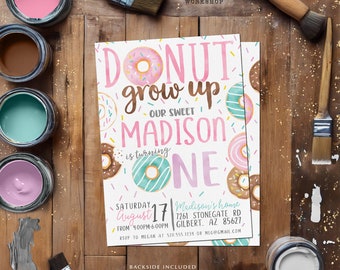 May include: A pink and white donut-themed first birthday party invitation with the text "Donut grow up" and "Our Sweet Madison is turning One". The invitation includes a date, time, and location for the party.